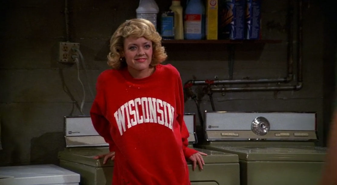 Laurie (Lisa Robin Kelly) wears a University of Wisconsin shirt in the &quo...
