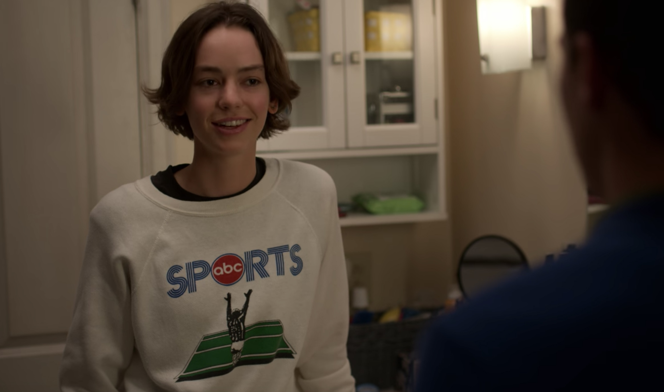 Casey (Brigette Lundy-Paine) wears an ABC Sports shirt in the “Only Tweed” ...